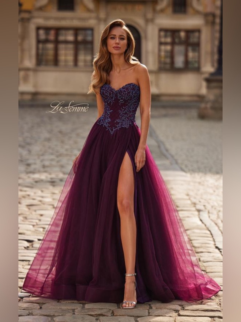 La Femme 33410
Tulle Ball Gown with Beaded Corset Bodice and High Slit.